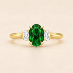 9ct yellow gold lab-grown emerald and diamond three-stone ring, front view
