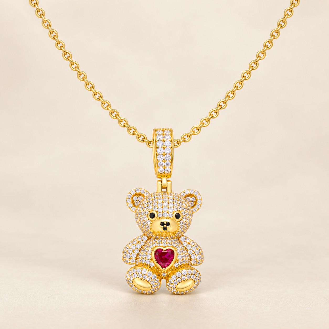 london-facets-gold-plated-cz-teddy-bear-necklace-hero Gold-plated sterling silver CZ teddy bear necklace on adjustable rolo chain.