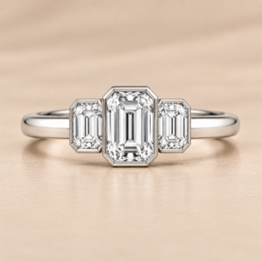 Front view of 9ct white gold three-stone emerald-cut lab-grown diamond ring
