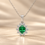 9ct white gold lab-grown emerald and diamond cluster pendant, front view